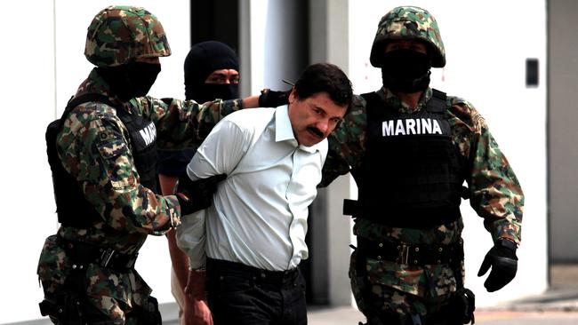 Mexican Navy soldiers escort Joaquin ‘El Chapo’ Guzman Lopez, leader of the Sinaloa Cartel. Picture: Getty Images