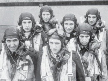 A RAAF crew of a Lancaster Bomber from No 460 Squadron RAAF. Left to right: 408034 Flying Officer (FO) M. W. Carroll DFC of Ferntree Gully, Vic; Sergeant D. G. Champkin, RAF; 414807 Pilot Officer T. J. Lynch of Toowoomba, Qld (back); 404507 Squadron Leader E. G. D. Jarman DFC (Captain) of Yeppoon, Qld (centre front); 404467 Flying Officer (FO) H. R. Harrison of Lismore, NSW; 404503 FO F. G. Jackson DFC OF Lismore, NSW; 411227 FO R. L. Neal of Grenfell, NSW.