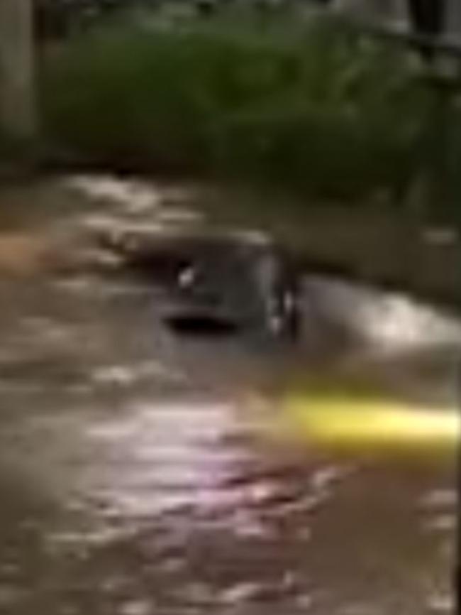 The Mercedes is no match for the sinkhole. Picture: Supplied