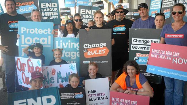 Dan Coxen, Michael Clifford, Judson Batey, Flynn Nutsch, Jaya Batey, Beth Luckel, Tara Dooley, Lulu Batey, Rachel Dixon, Steve Peacock, Rebecca Galdies, Grant Burton, Jess Laidlay, and Vanessa Purtel protest outside MP Michelle Landry's office. Picture: Jann Houley