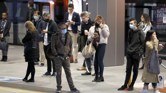 Commuters at Sydney’s Chatswood station await their train on Sunday. Picture: Damian Shaw