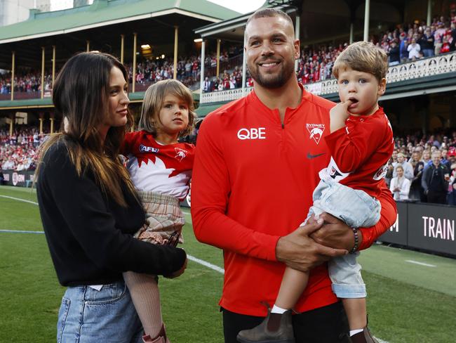 Buddy Franklin during a lap of honour with Jesinta and their children Rocky and Tullulah at halftime of the Sydney Swans Round 24 match against Melbourne at the SCG in 2023. Picture: Jonathan Ng