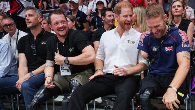 The 38-year-old cheered on both teams as he sat next to Royal Marine veteran and triple amputee Mark Ormrod. Picture: Getty Images.