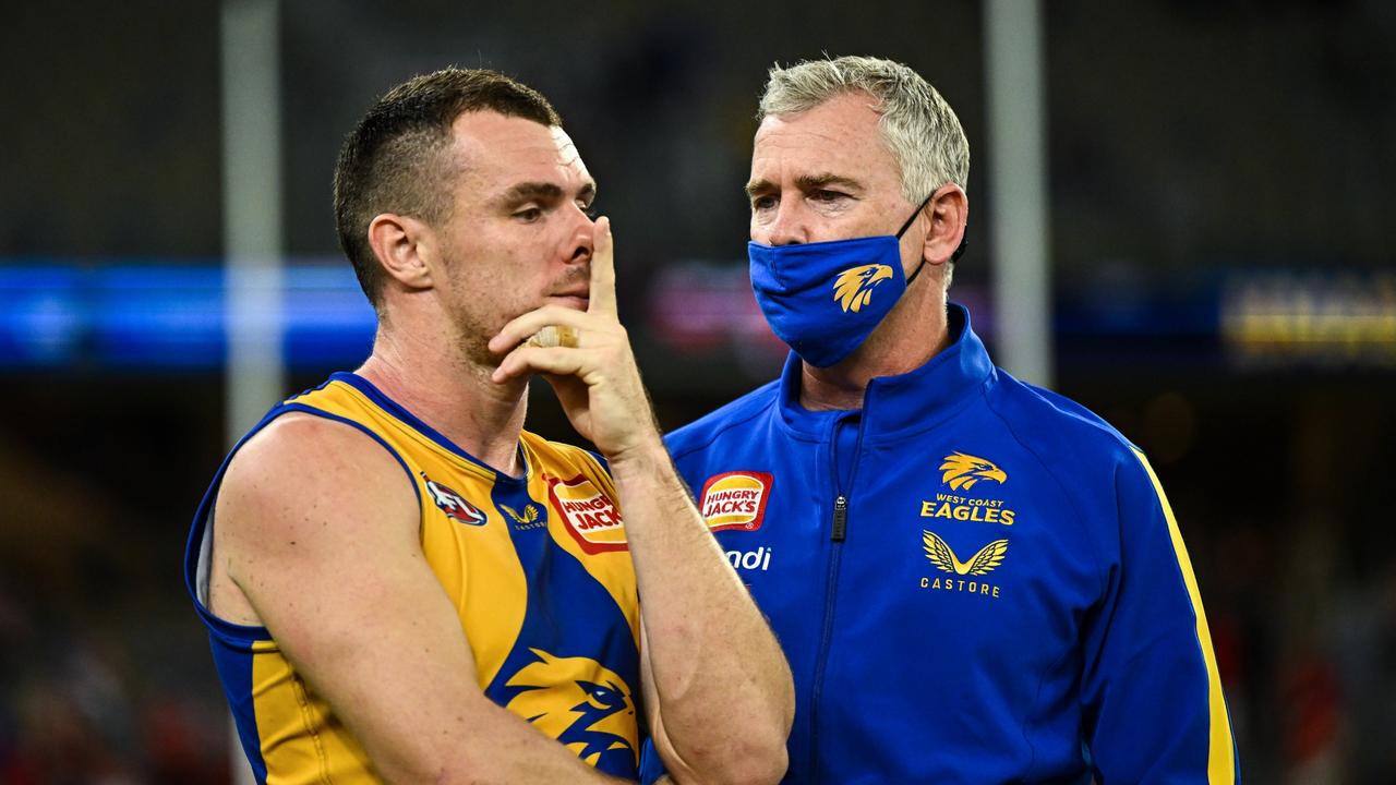 PERTH, AUSTRALIA - APRIL 15: Adam Simpson, Senior Coach of the Eagles talks with Luke Shuey after the loss during the 2022 AFL Round 05 match between the West Coast Eagles and the Sydney Swans at Optus Stadium on April 15, 2022 In Perth, Australia. (Photo by Daniel Carson/AFL Photos via Getty Images)
