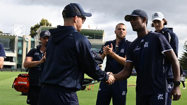 Ashley Chandrasinghe receives his debut cap during the Sheffield Shield match between Tasmania and Victoria at Blundstone Arena. (Photo by Steve Bell/Getty Images)