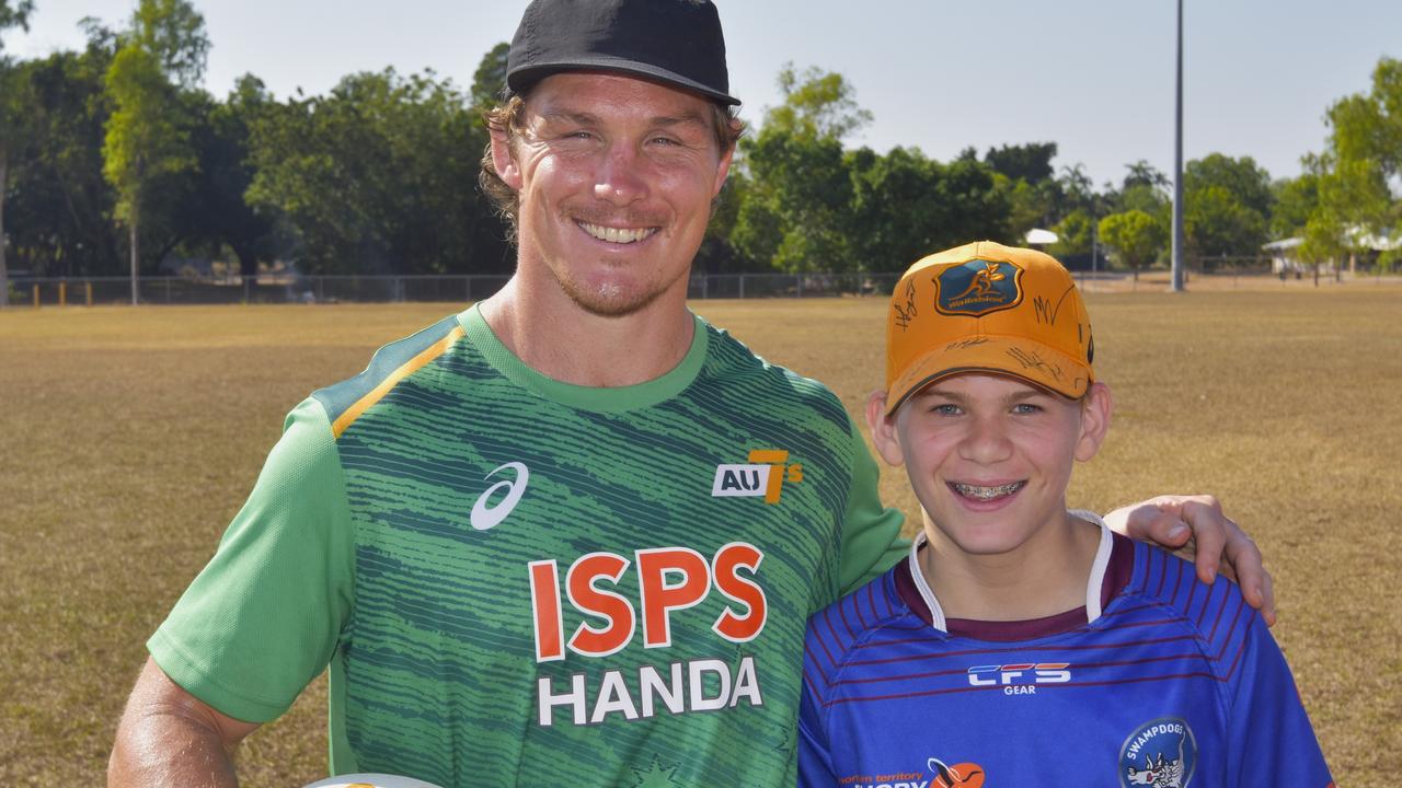 Former Wallabies captain turned 7s player Michael Hooper with NT rugby junior Clancy Nason. Picture: Darcy Jennings.