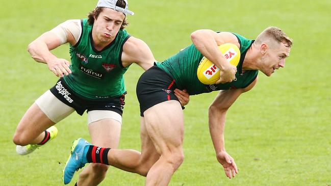 Bomber Devon Smith, right, won the best-and-fairest in his first season at the club.