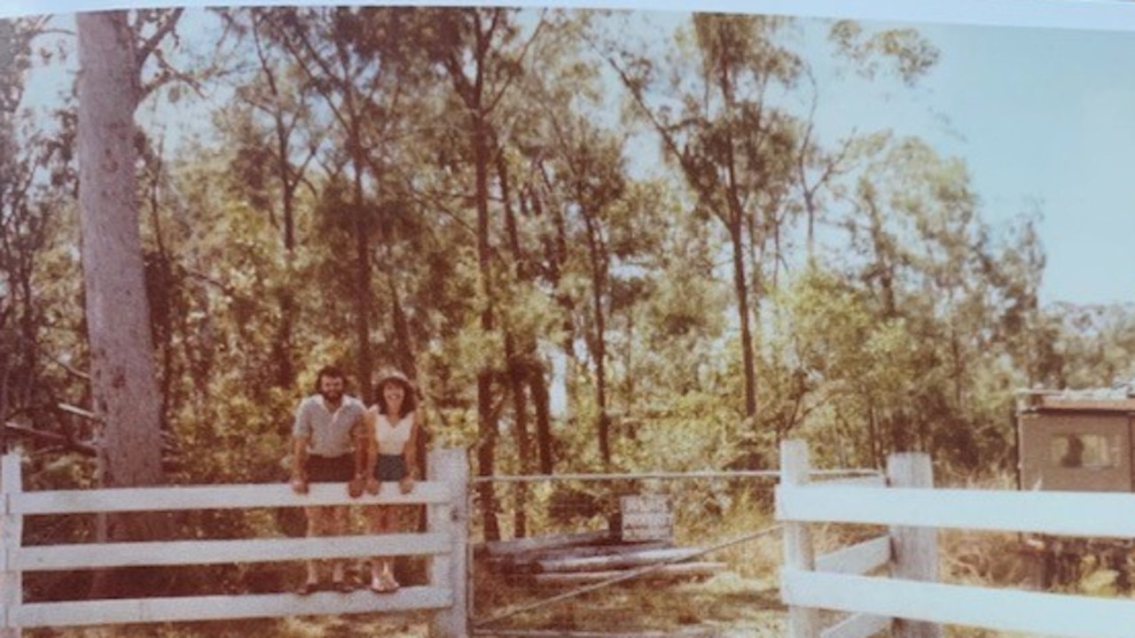 Marto and Genevieve Martin at the front gate of Ferns Hideaway Resort in the beginning in 1984.