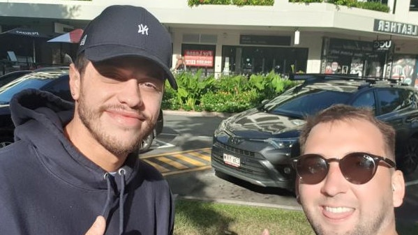 Actor and comedian Pete Davidson posing for pictures with fan Sean Fitzgerald on Cairns Esplanade. Photo: Instagram/@seanontour Copyright: Supplied