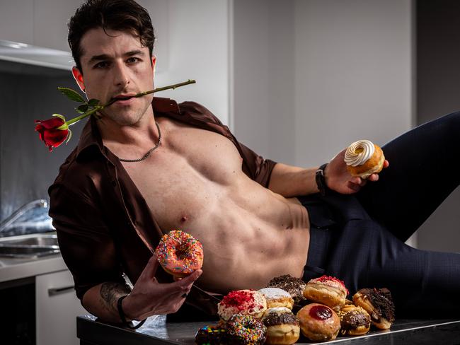 Founder of Levain Doughnuts Anthony Randello Jahn, in his apartment where he films his donut making Instagram videos. @thedonutdaddy has amassed 646k followers on Instagram for his racy cooking videos.  Picture: Jake Nowakowski