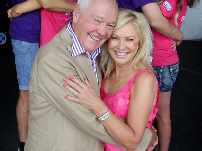 Kerri-Anne and John Kennerley embrace in happier times.