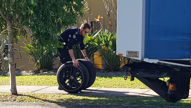 Officers seize tyres from a home in Robina. Allegedly stolen by Mexican Hoon Cartel members.