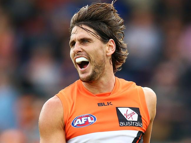 CANBERRA, AUSTRALIA - APRIL 17:  Ryan Griffen of the Giants celebrates a goal during the round four AFL match between the Greater Western Sydney Giants and the Port Adelaide Power at Star Track Oval on April 17, 2016 in Canberra, Australia.  (Photo by Mark Nolan/AFL Media/Getty Images)