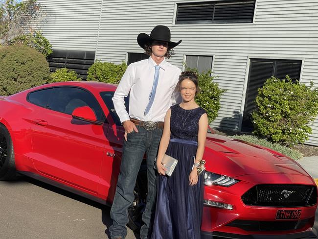 Chloe Burt and Erik Stewart arrive at the formal in style.