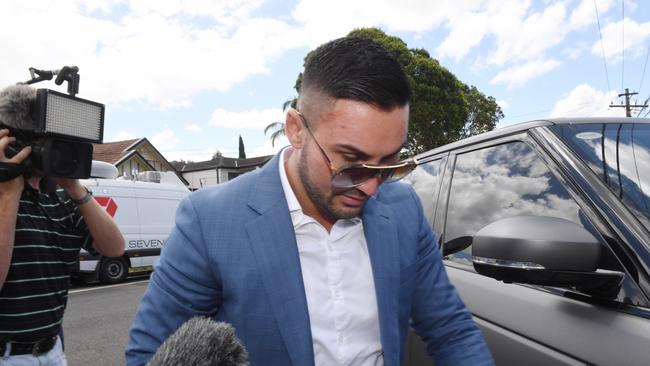 Former Auburn deputy mayor Salim Mehajer returns home as police continue to raid his home in Lidcombe. Picture: AAP Image/Dean Lewins.