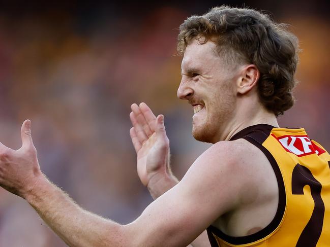 MELBOURNE, AUSTRALIA - AUGUST 20: Denver Grainger-Barras of the Hawks celebrates a goal during the 2023 AFL Round 23 match between the Melbourne Demons and the Hawthorn Hawks at Melbourne Cricket Ground on August 20, 2023 in Melbourne, Australia. (Photo by Dylan Burns/AFL Photos via Getty Images)