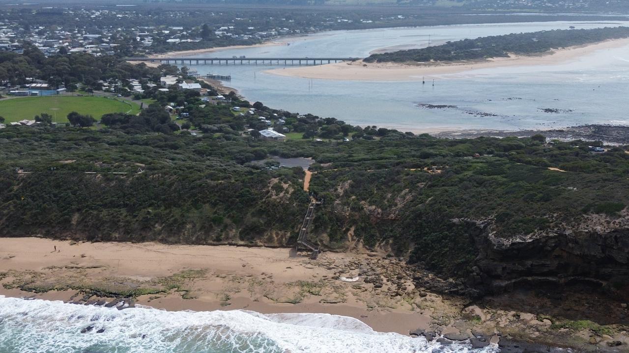 The whale carcass remains close to the bluff at Barwon Heads, with many of the town’s locals fearing it could disrupt business. Brad Fleet