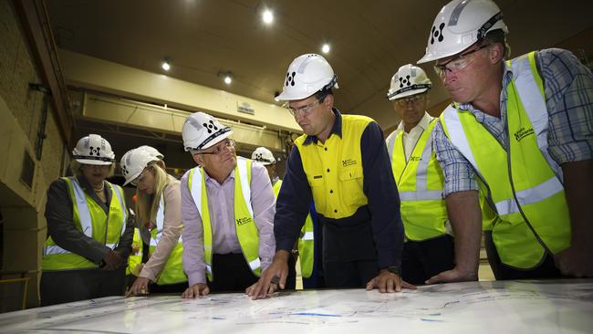 Prime Minister Scott Morrison, Hydro Tasmania Manager of Production and Maintenance Jesse Clark and Premier Will Hodgman during a tour of the Lake Cethana Power Station, one of the sites shortlisted for pumped hydro, in February. Picture: CHRIS KIDD