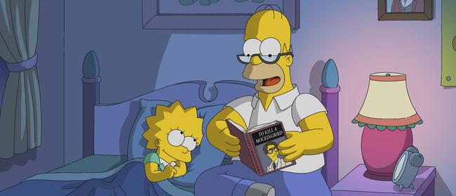 Story time … a scene from season 30 of The Simpsons, as Homer reads To Kill A Mockingbird to daughter Lisa. Picture: Supplied/Fox