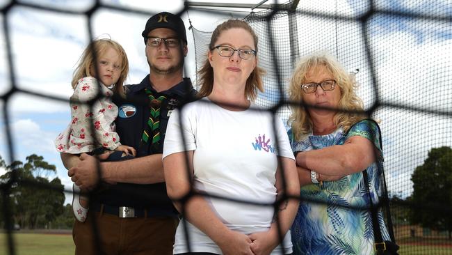 David Ballard and daughter Hailey, Lisa Radford and Cath Pezzimenti are concerned about birds getting trapped in netting on the discus cage at Croydon Athletics Track. Picture: Hamish Blair