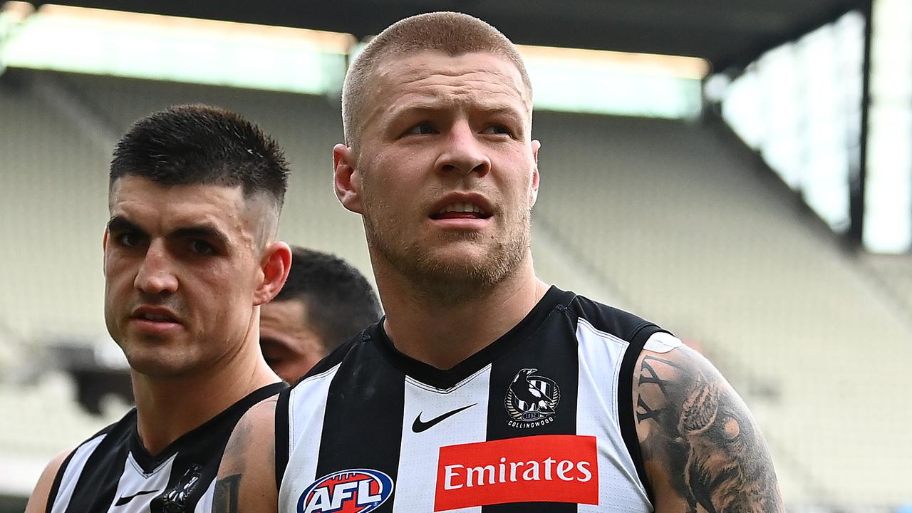 MELBOURNE, AUSTRALIA - MAY 01: Brayden Maynard and Jordan De Goey of the Magpies look dejected after losing the round seven AFL match between the Collingwood Magpies and the Gold Coast Suns at Melbourne Cricket Ground on May 01, 2021 in Melbourne, Australia. (Photo by Quinn Rooney/Getty Images)