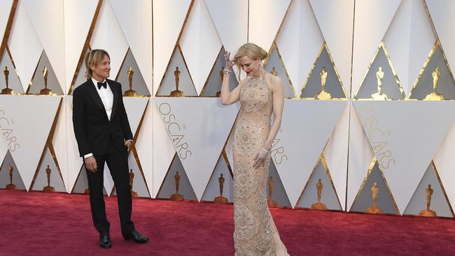 Keith Urban, left, and Nicole Kidman arrive at the Oscars. Picture: AP