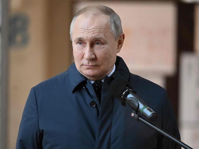 Russian President Vladimir Putin visits the National Space Centre construction site in Moscow.