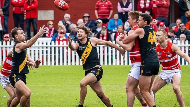 Glenelg's Matthew Snook has eyes only for the ball during last Sunday’s titanic clash against North Adelaide at Prospect Oval. Picture: Tom Huntley.