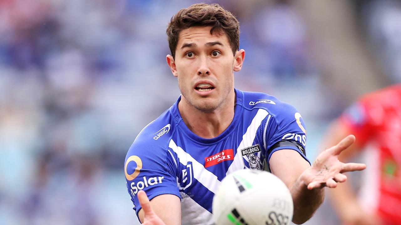 SYDNEY, AUSTRALIA - JUNE 14: Nick Meaney of the Bulldogs passes during the round 14 NRL match between the Canterbury Bulldogs and the St George Illawarra Dragons at Stadium Australia, on June 14, 2021, in Sydney, Australia. (Photo by Mark Kolbe/Getty Images)