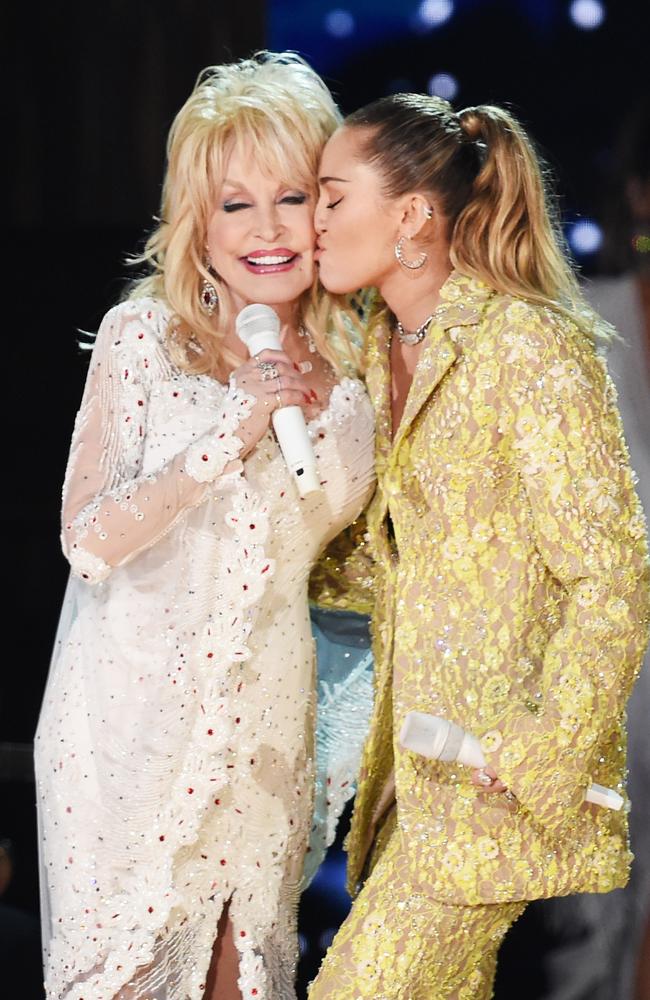 Dolly Parton and Miley Cyrus perform onstage during the Grammys. Picture: Getty