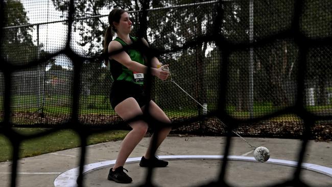 Holly Hodges goes through her hammer throw routine. Picture: Andy Brownbill