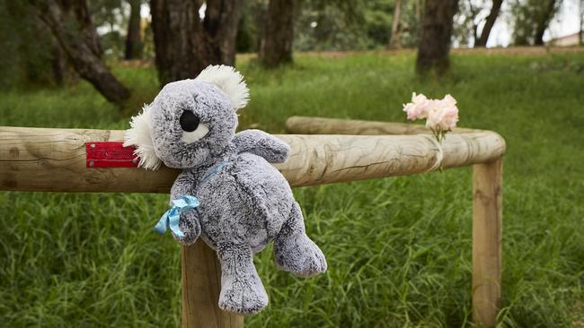 Memorial flowers and toys have been left at the Little Para River site where a toddler drowned over the weekend. Picture: Matt Loxton