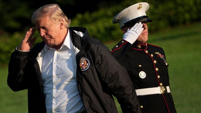 US President Donald Trump salutes upon return to the White House. Picture: AFP