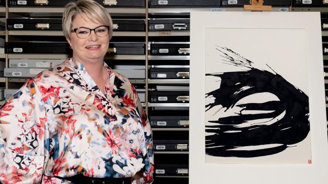 QVMAG General Manager of Creative Arts and Cultural Services Tracy Puklowski with Brett Whiteley's Waves V. Picture: Angela Casey