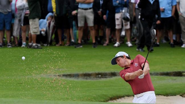 It was wet at the Waialae Country Club. Picture: Getty Images