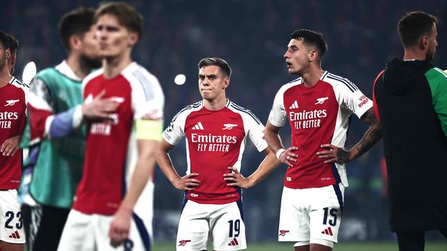 Arsenal players react after losing the Champions League semi-final. (Photo by Thibaud MORITZ / AFP)