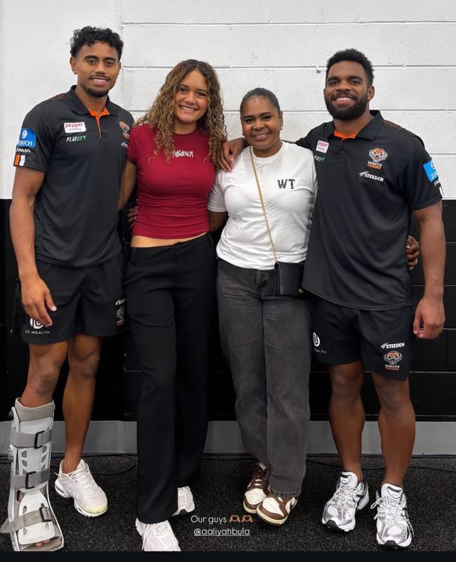 Jahream Bula (left) in a moon boot at full time.