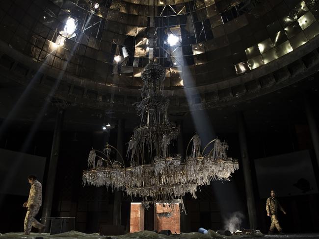 General News - Third Prize, Stories © Alessio Romenzi Title: We Are Not Taking Any Prisoners Fighters of the Libyan forces affiliated to the Tripoli government walk around the gigantic chandelier of the conference room in Ouagadougou Congress Complex. Story: Sirte, Libya, is one of the three self-proclaimed capitals of the so-called Islamic State, along with Raqqa in Syria and Mosul in Iraq. It was the first of the three to fall, with an offensive launched by the Libyan government in May 2016. It took seven months of fighting, 500 American airstrikes, the lives of 700 Libyan soldiers and more than 3,000 injured Libyan soldiers to finally declare the city free.