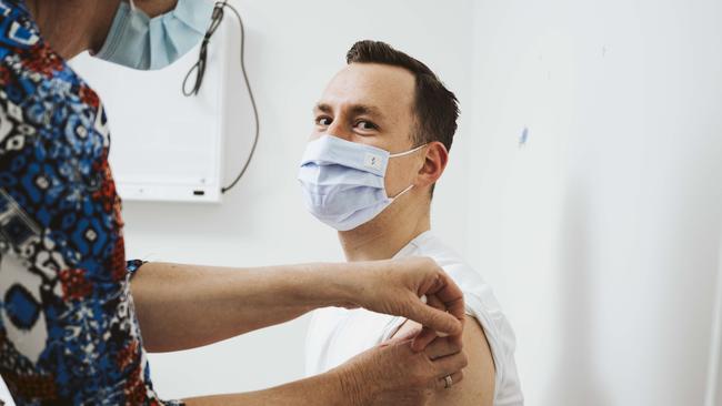 28-year old William Stoltz gets the AstraZeneca vaccine on 29 June, in Canberra. Photo: Jamila Toderas