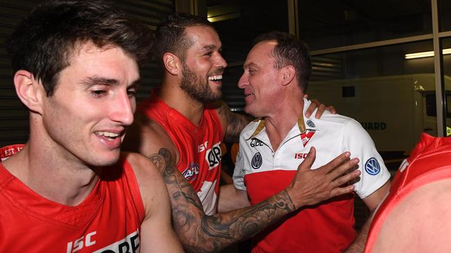 Lance Franklin and John Longmire celebrate after the game.