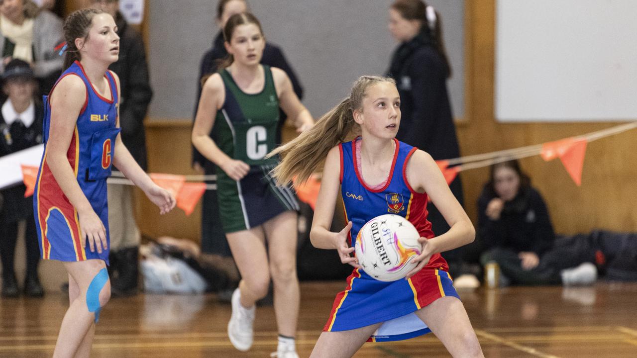 Tilly Wicks of Downlands Junior C against St Ursula's Junior Development in Merici-Chevalier Cup netball at Salo Centre, Friday, July 19, 2024. Picture: Kevin Farmer