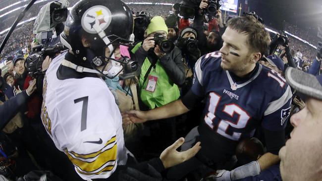 Pittsburgh Steelers quarterback Ben Roethlisberger, left, congratulates New England Patriots quarterback Tom Brady yesterday