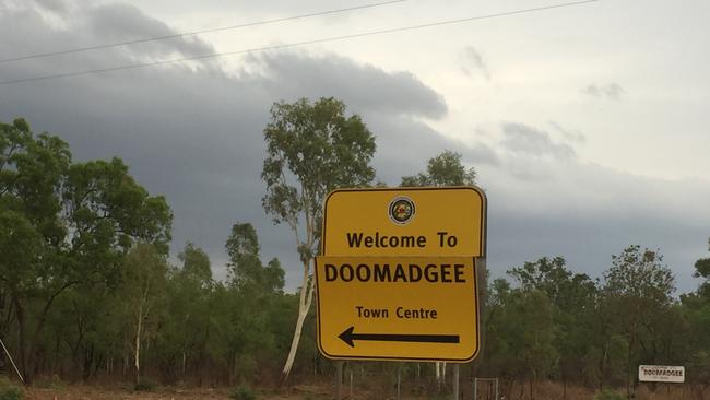 A sign at the entrance to the township of Doomadgee.