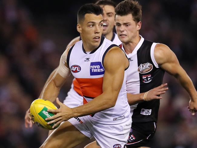 AFL Round 7. St Kilda vs. GWS Giants at Etihad Stadium.  GWS Giants Dylan Shiel clears from the middle infant of St Kilda's Jack Sinclair     . Pic: Michael Klein