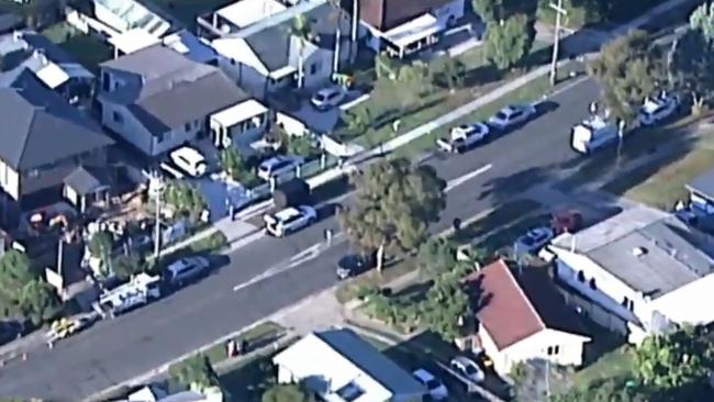 Police at the scene of the alleged stabbing in Heckenberg Ave. Picture: 7 News Sydney