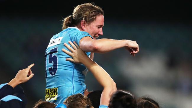 Ash Hewson celebrates the Waratahs’ Super W grand final win last year. Picture: Getty Images 