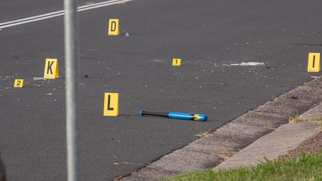 A baseball bat at the crime scene at Karangi Road, Whalan. Picture: Julian Andrews