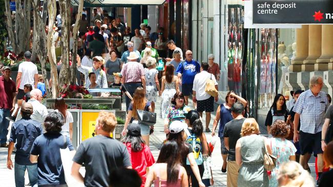 Shoppers out in force in Brisbane’s Queensland Street Mall between Christmas and New Year. Picture: Liam Kidston.