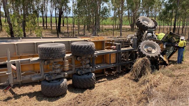 Photographs from the scene of an accident after a haul-out vehicle rolled on the intersection of Bambaroo Road and the Bruce Highway between Townsville and Ingham on Tuesday morning. Picture: Supplied