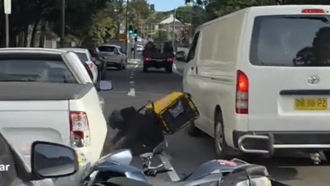 A delivery driver is hit by a vehicle after fleeing the scene of a suspected hit-and-run on Unwins Bridge Road, Sydenham. Picture: Supplied